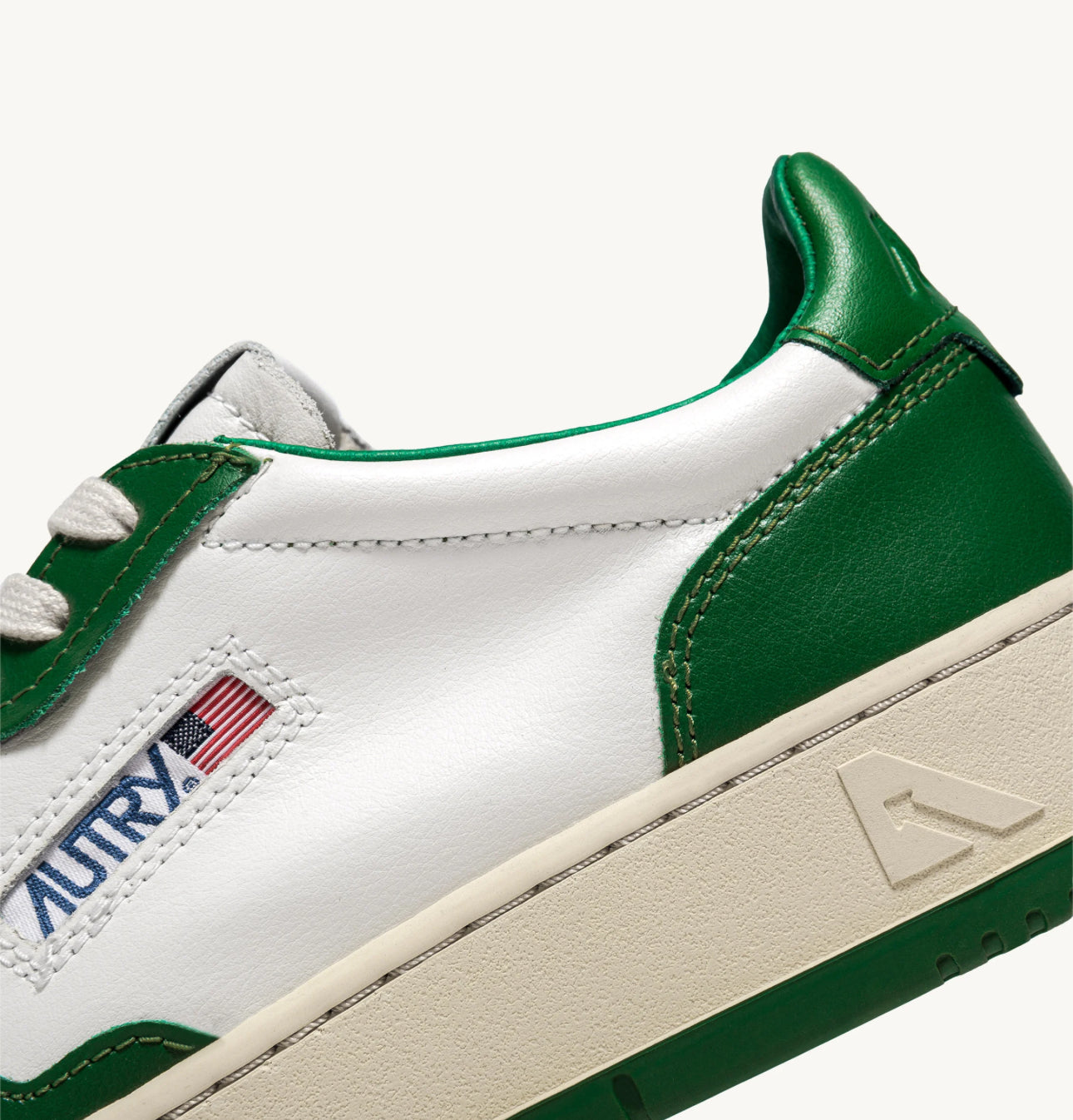 AUTRY SNEAKERS MEDALIST LOW BICOLOR SNEAKERS IN WHITE AND GREEN LEATHER