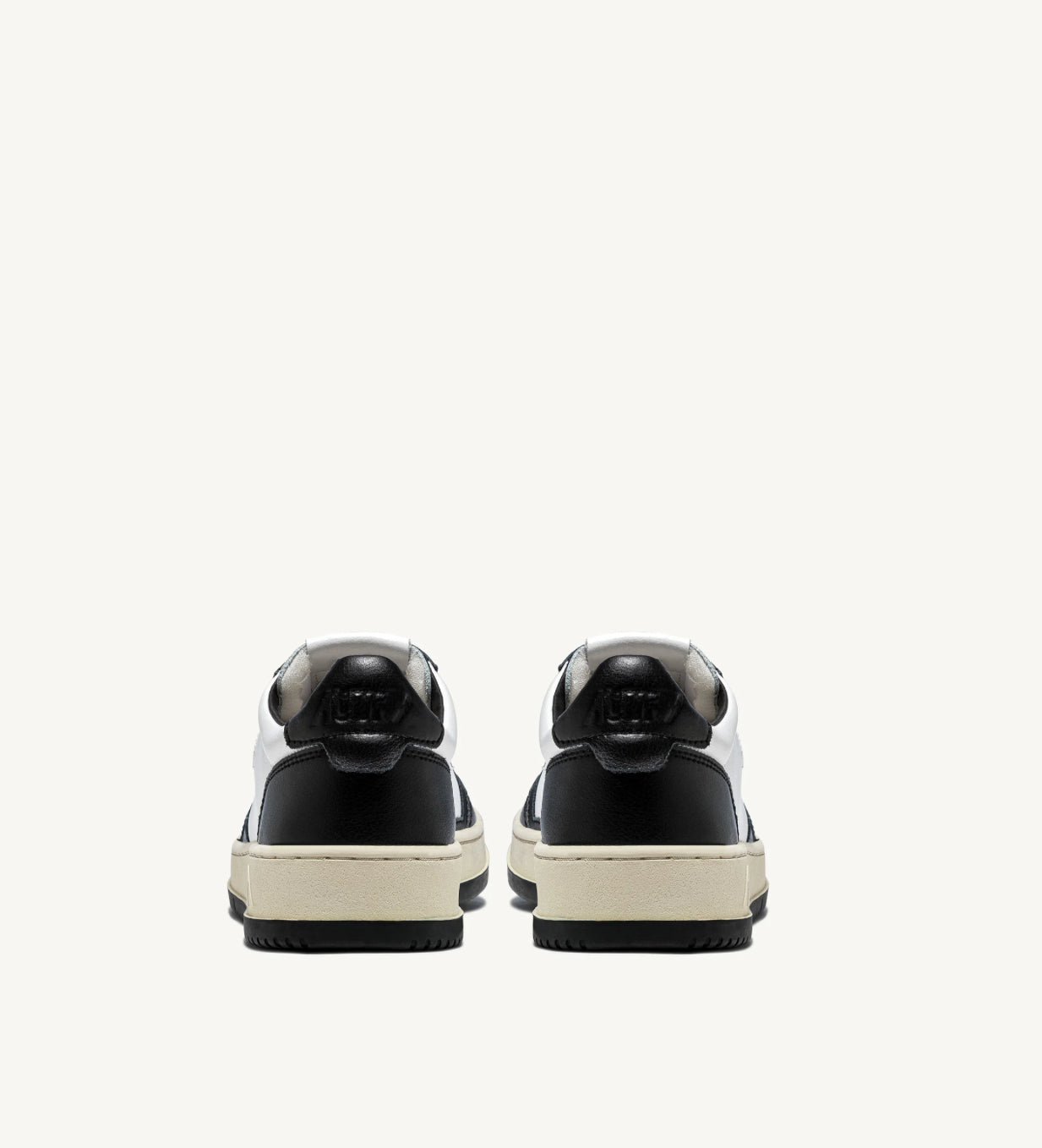AUTRY SNEAKERS MEDALIST LOW BICOLOR SNEAKERS IN WHITE AND BLACK LEATHER