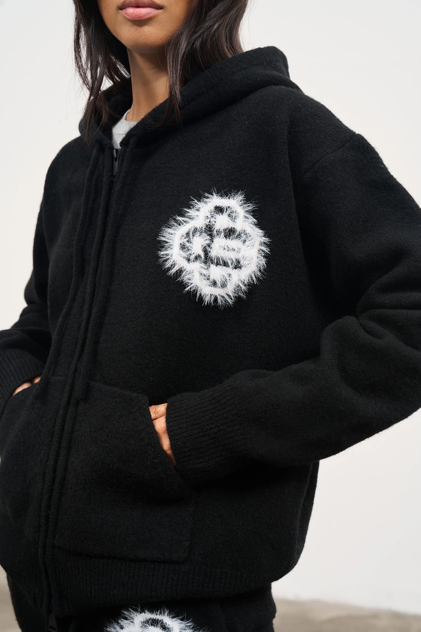 FLUFFY EMBLEM ZIP THROUGH KNITTED HOODIE