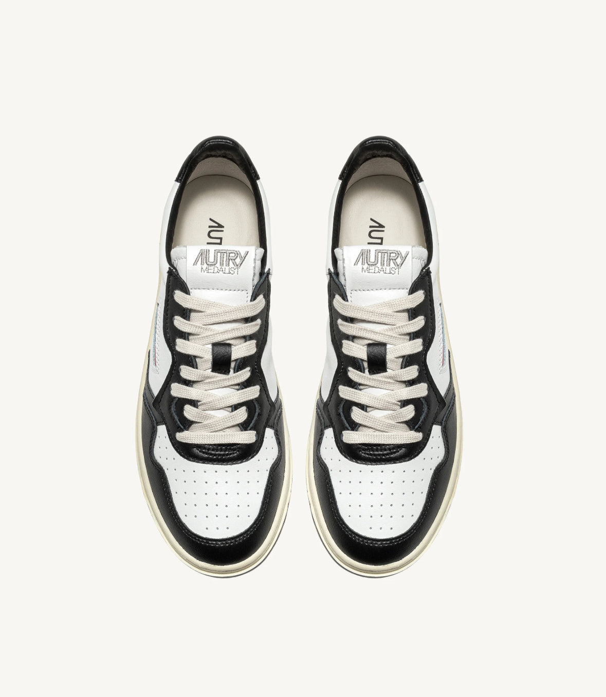 AUTRY SNEAKERS MEDALIST LOW BICOLOR SNEAKERS IN WHITE AND BLACK LEATHER