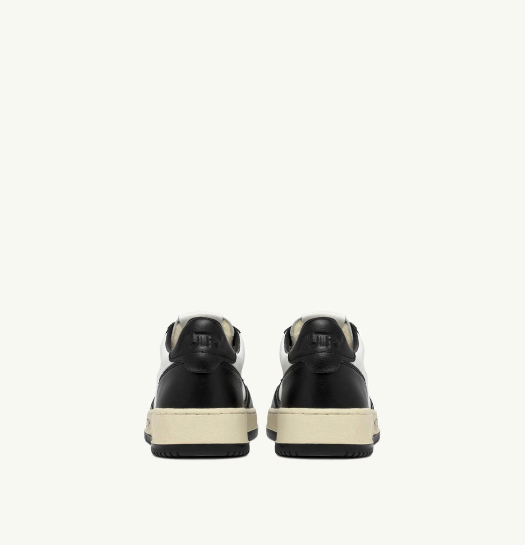 AUTRY SNEAKERS MEDALIST LOW SNEAKERS IN WHITE AND BLACK LEATHER WITH LETTERINGAULM - BH02