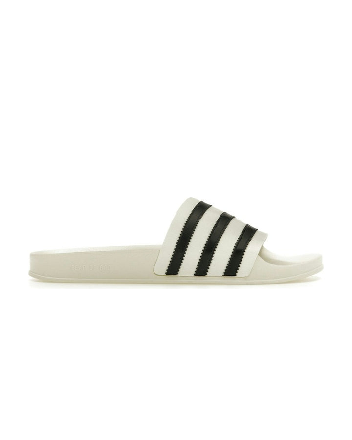 ADIDAS UNISEX ATHLETICS ADILETTE X FEAR OF GOD CREAM WHITE - כפכפי אדידס אדילט פיר אוף גוד אתלטיקס שמנת ושחור יוניסקס - תמונה 1