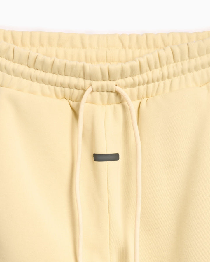 ADIDAS MEN'S ATHLETICS HEAVY FLEECE SWEATPANT X FEAR OF GOD ATHLETICS PALE YELLOW BLACK - מכנס טרנינג אדידס פיר אוף גוד צהוב וניל ושחור לגברים - תמונה 4